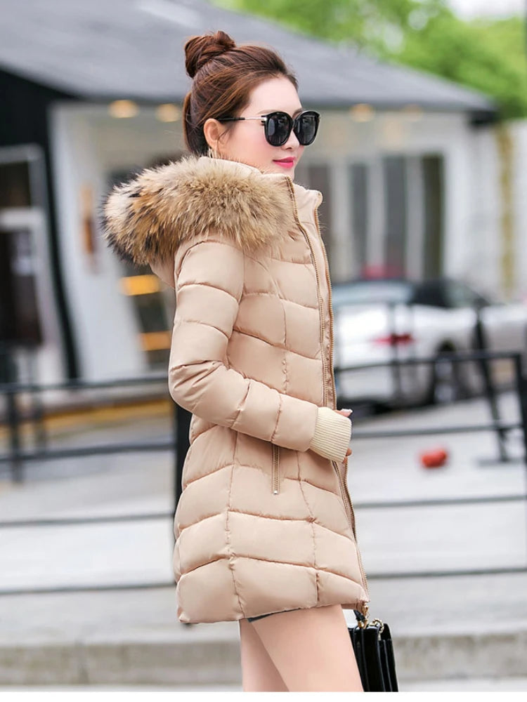 Cece | Long fur jacket with puffer details