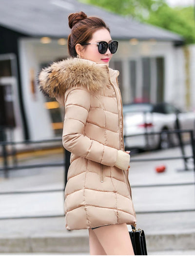 Cece | Long fur jacket with puffer details