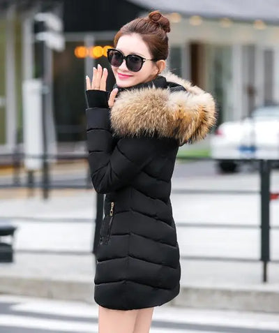 Cece | Long fur jacket with puffer details