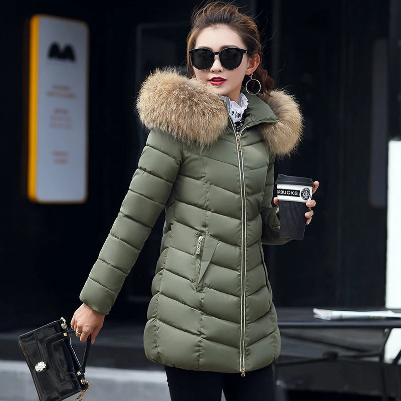 Cece | Long fur jacket with puffer details