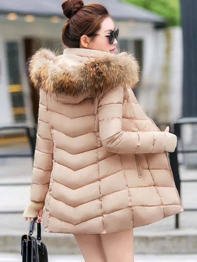 Cece | Long fur jacket with puffer details